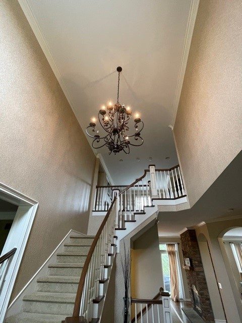 staircase walls painted in a very light brown color