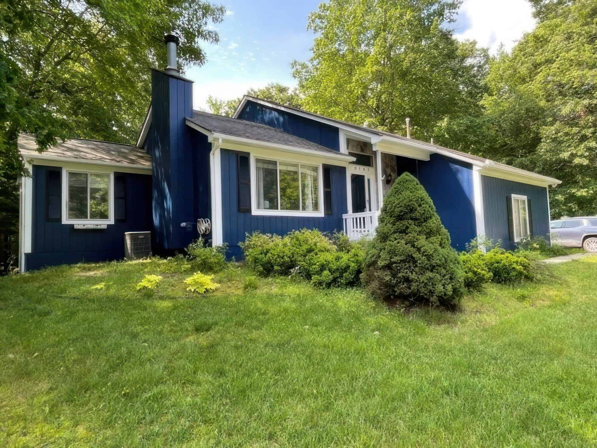 House with blue walls and white trim